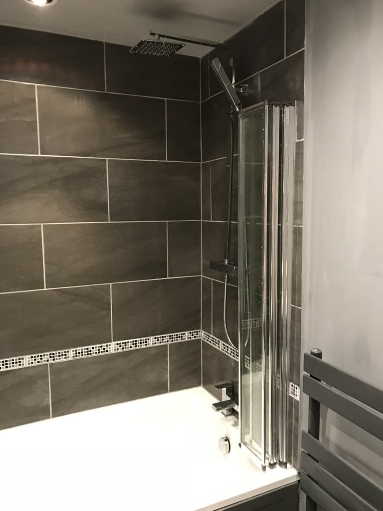 Cover image showcasing the completed Modern grey tiled bathroom project in Southmead, Bristol